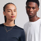 ACT necklace 2-in-1 silver-plated: A man and woman showcase layered curb chain necklaces with black Agate pendant, reflecting Scandinavian elegance.