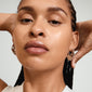 DAWN silver-plated hoop earrings from Pilgrim's IMAGINATION collection, showcased on a woman, highlighting their elegant design and fashion-forward appeal.