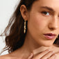 SUNSET crystal earrings gold-plated, featuring organic-shaped links with Preciosa crystals, adorn a woman's ear, showcasing Pilgrim's blend of style and sustainability.