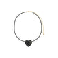 STAY black agate necklace gold-plated with a large heart pendant, black leather cord, and gold extension chain, combining earthy elegance with a bohemian touch.