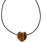 STAY tiger eye necklace silver-plated featuring a large heart-shaped Tiger Eye pendant with black leather cord and silver-plated chain, ideal for a bohemian style.