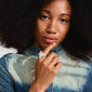 Close-up of a woman wearing the RYAN silver-plated heart ring, a bold statement piece from Pilgrim's IMAGINATION collection, showcasing a unique, handcrafted design.