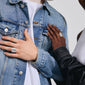 Close-up of a woman's hand showcasing the LAUREL silver-plated ring from Pilgrim, featuring a wavy design with an edgy, trendy vibe.