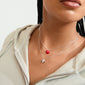 MAEVE necklace, 2-in-1 set: a woman models silver-plated box chains, featuring a puffy heart and a red enamel heart pendant.