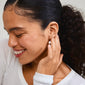 Close-up of a woman wearing JASMIN pearl earrings, showcasing rose gold-plated hoops with sparkling crystals and freshwater pearl pendants.