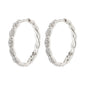 EZO twirled crystal hoops, silver-plated, with twisted details and Preciosa crystals, featuring a braided silhouette and smart click lock for easy wear.