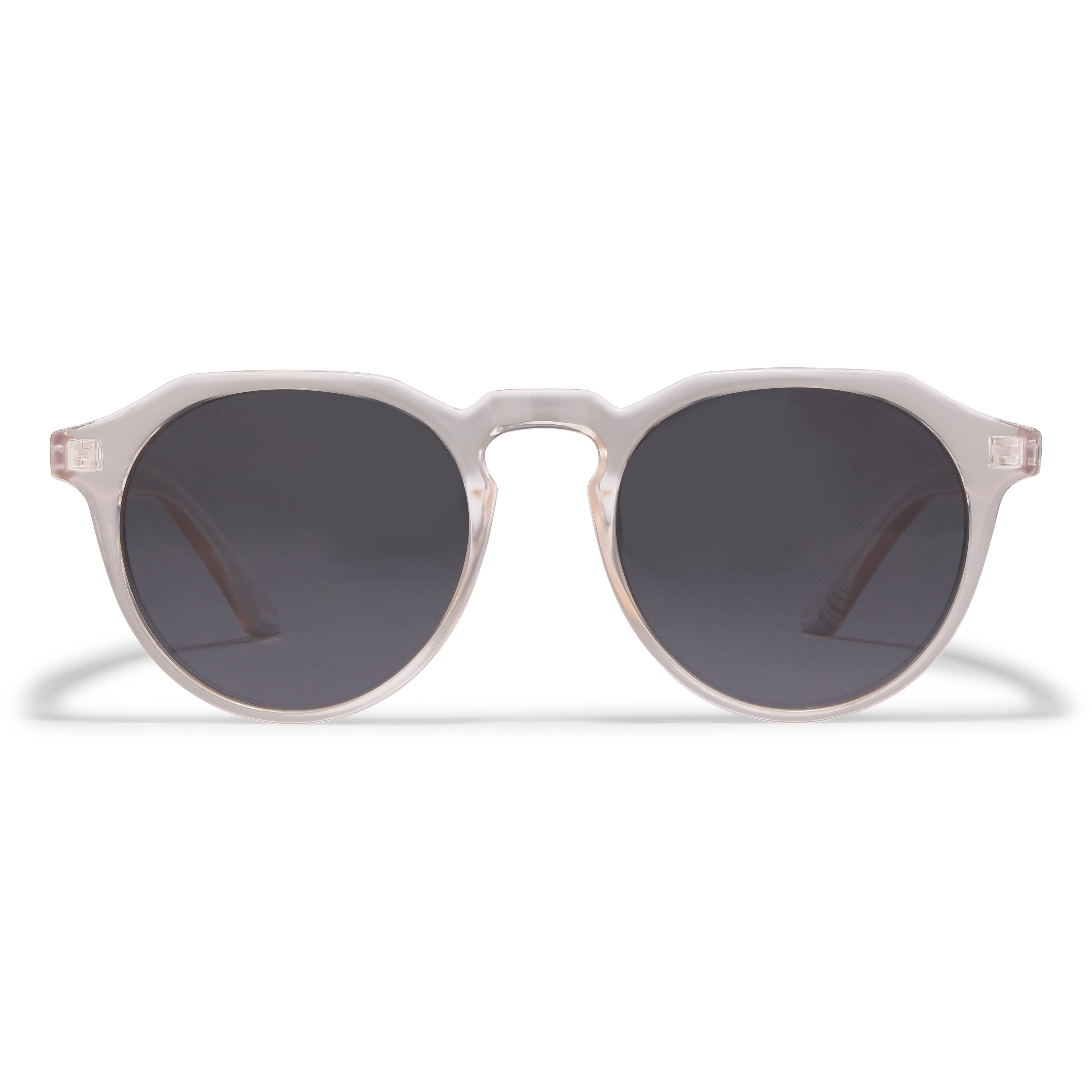 ALEJANDRA sunglasses with transparent frames and smoke lenses, offering a stylish and quirky touch, designed by Pilgrim for modern trendsetters.