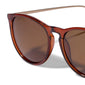 VANILLE sunglasses brown/gold: Elegant sunglasses with slim gold-plated temples and a sleek, transparent dark brown frame, ideal for minimalist summer style from Pilgrim.