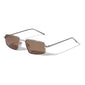 AMIYAH sunglasses with brown lenses and edgy metal frame, featuring UVA/UVB protection, from Pilgrim. Perfect for adding attitude to any outfit.